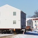 Workers successfully move second World War II barracks at Fort McCoy; preparations under way to move third building