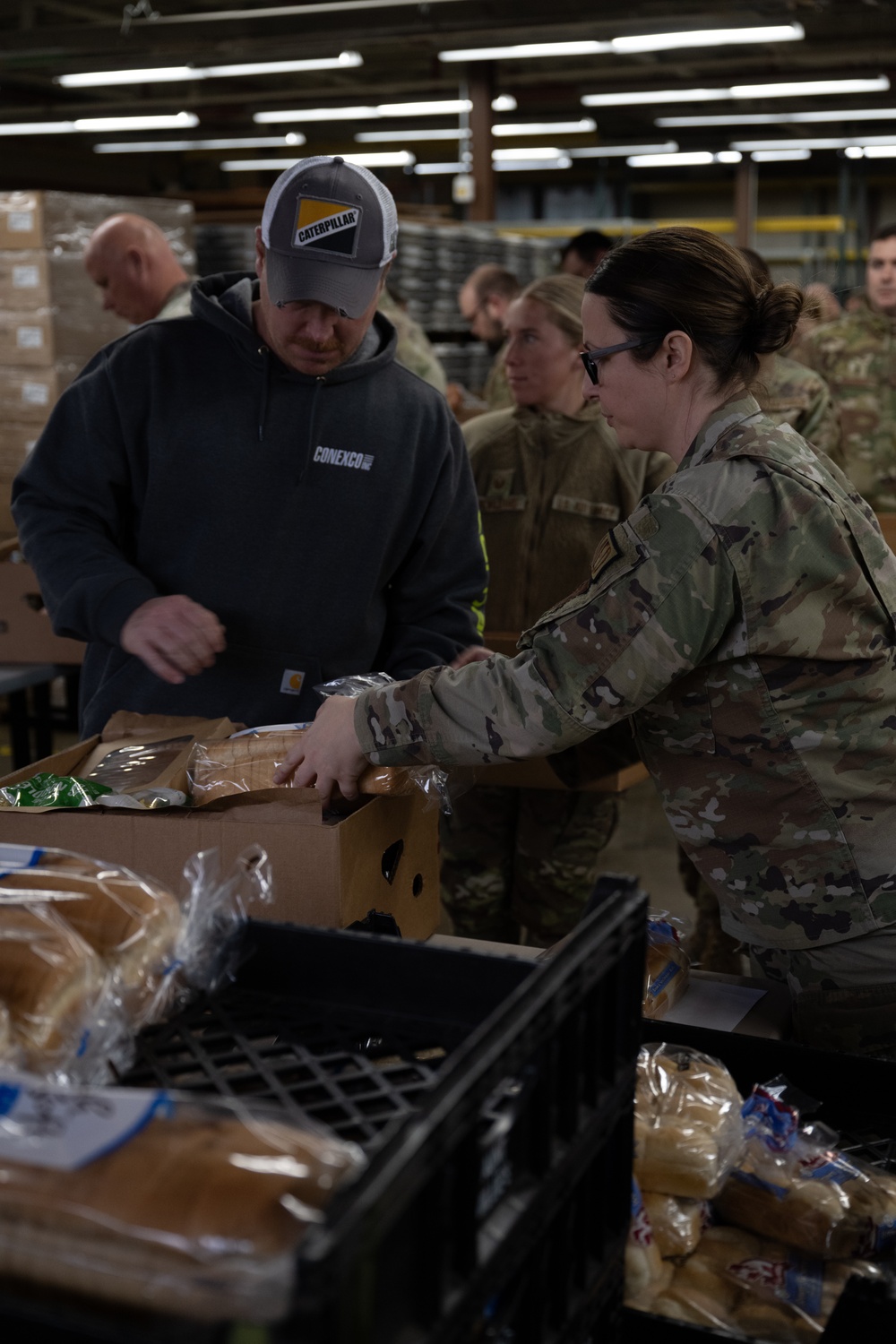 181st Intelligence Wing Assemble Meal Baskets for Community Distribution