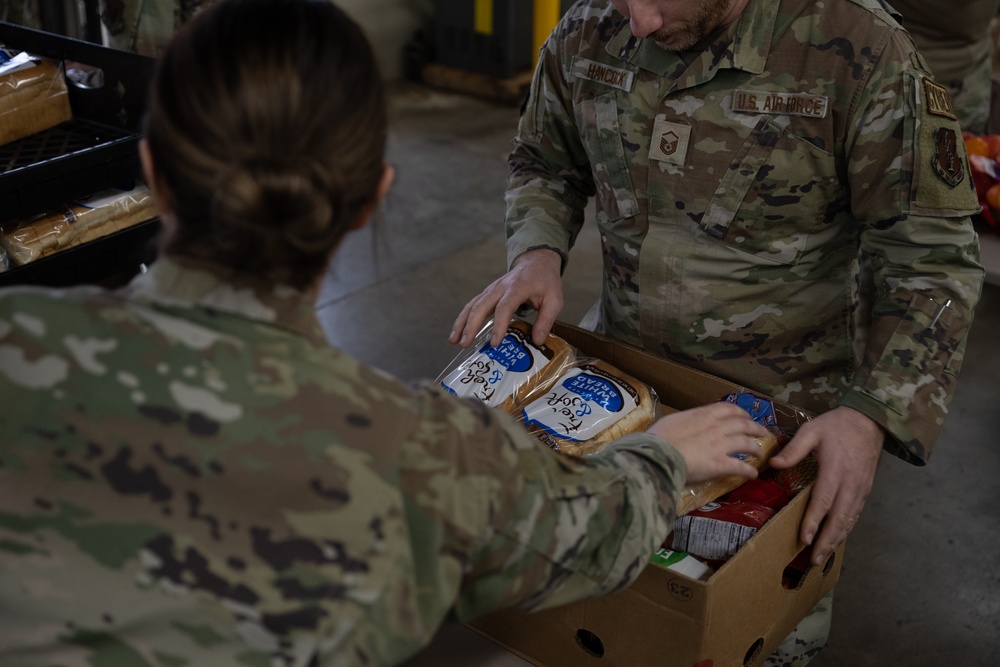 181st Intelligence Wing Assemble Meal Baskets for Community Distribution