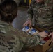 181st Intelligence Wing Assemble Meal Baskets for Community Distribution