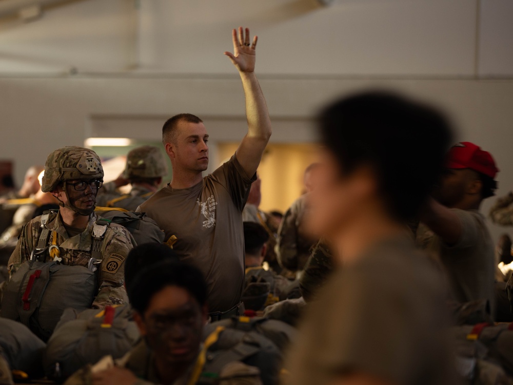 Paratroopers prepare to jump