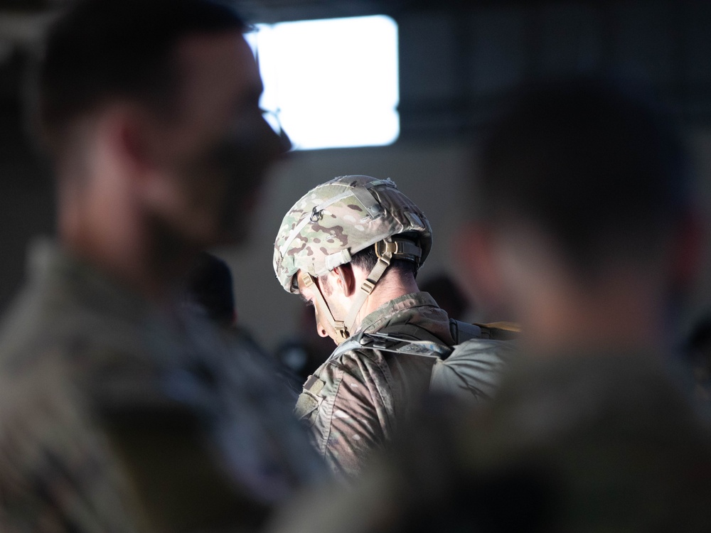 Paratroopers prepare to jump