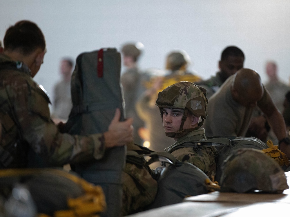 Paratroopers prepare to jump