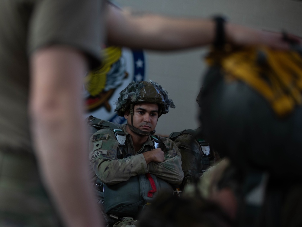 Paratroopers prepare to jump