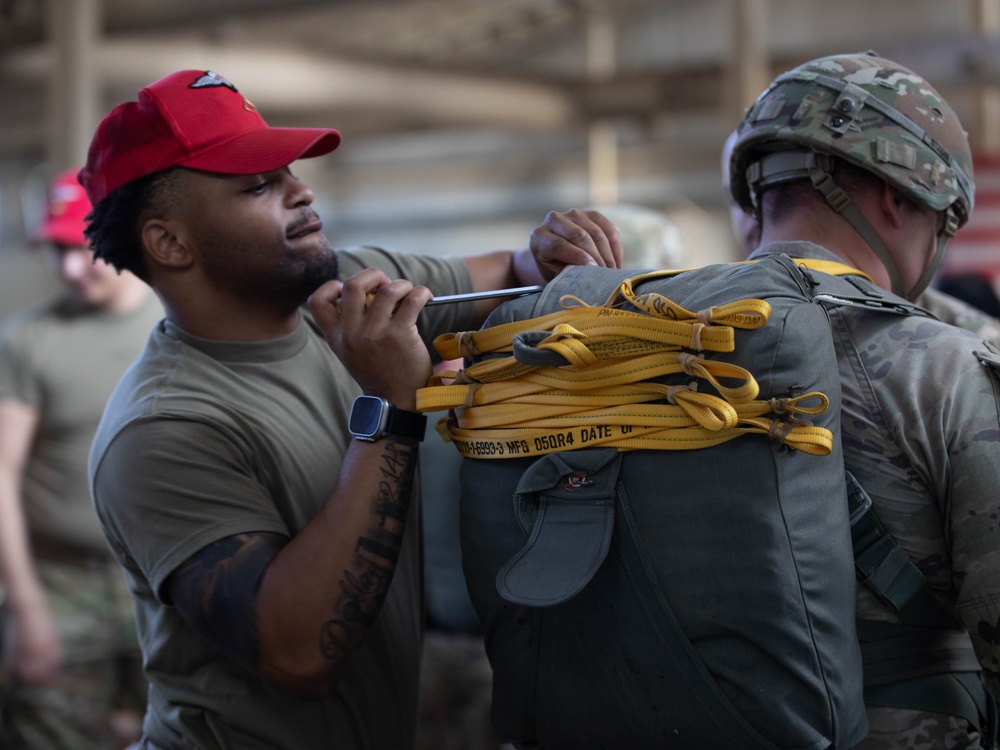 Paratroopers prepare to jump