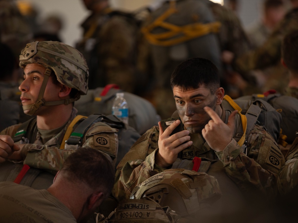 Paratroopers prepare to jump