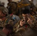 Paratroopers prepare to jump
