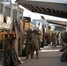 Paratroopers unload parachutes
