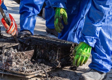 Airmen Disassemble Hazardous Lithium-ion Batteries
