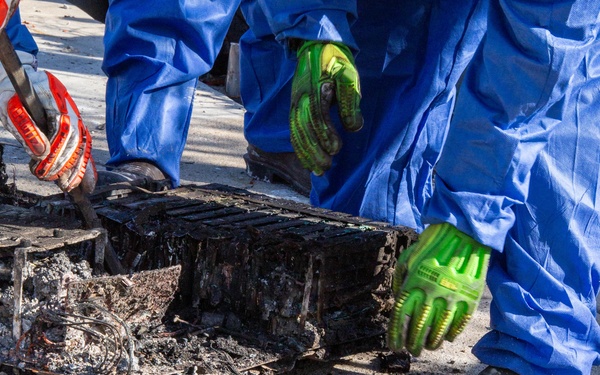 Airmen Disassemble Hazardous Lithium-ion Batteries