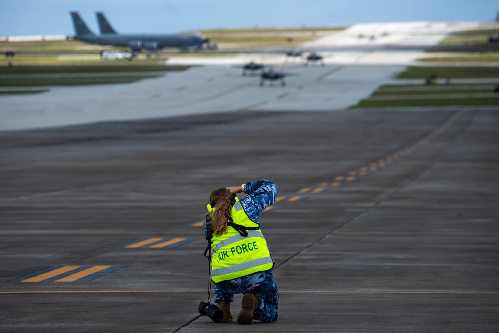 Trilateral partners come together on the flight line at Andersen AFB for CN25