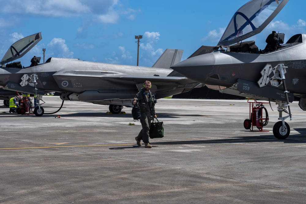 Trilateral partners come together on the flight line at Andersen AFB for CN25