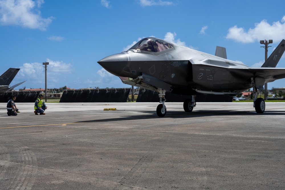 Trilateral partners come together on the flight line at Andersen AFB for CN25