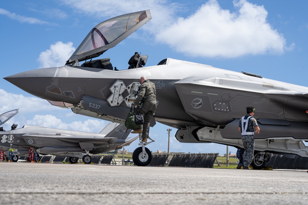 Trilateral partners come together on the flight line at Andersen AFB for CN25