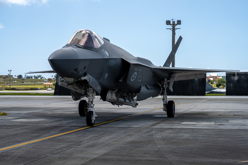 Trilateral partners come together on the flight line at Andersen AFB for CN25