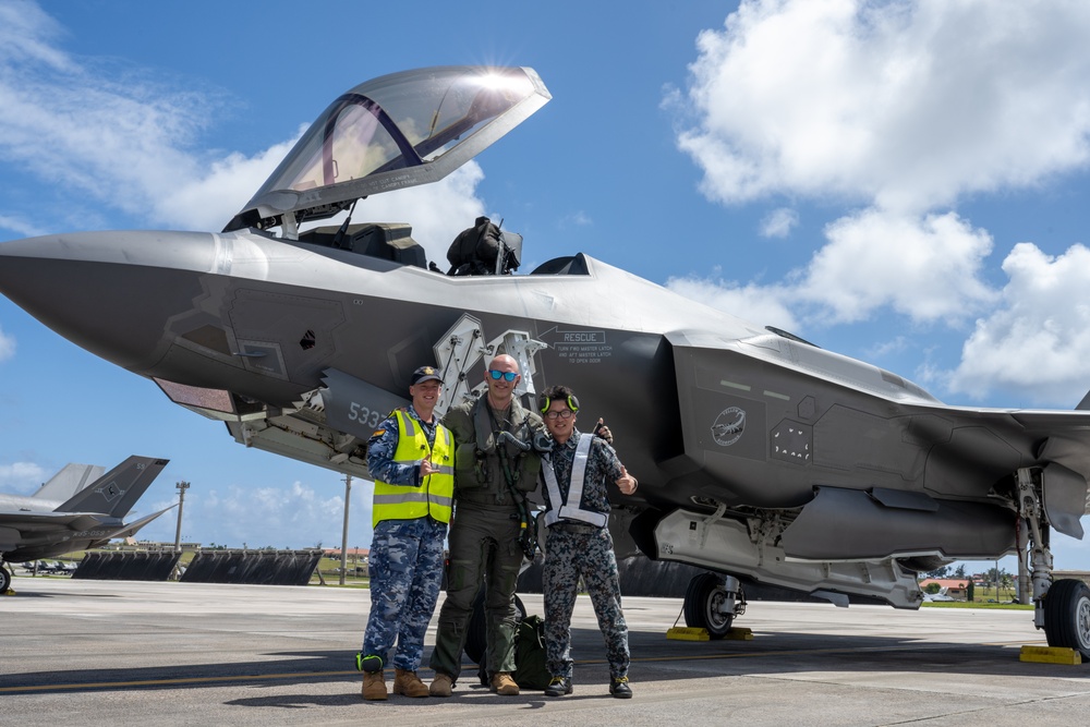 Trilateral partners come together on the flight line at Andersen AFB for CN25