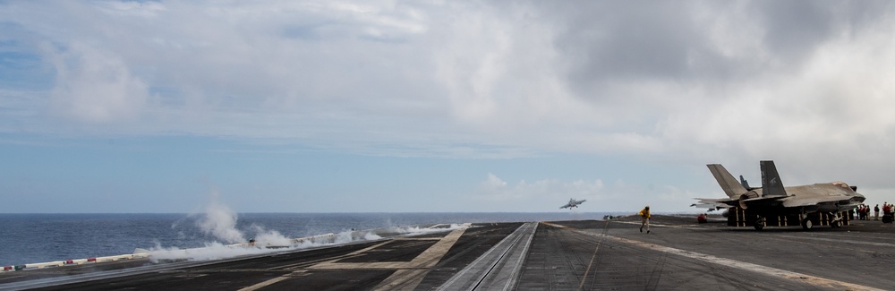 Rear Adm. Michael Wosje, commander of Carrier Strike Group ONE, completes his 1,000th trap flight aboard Nimitz-class aircraft carrier USS Carl Vinson (CVN 70)