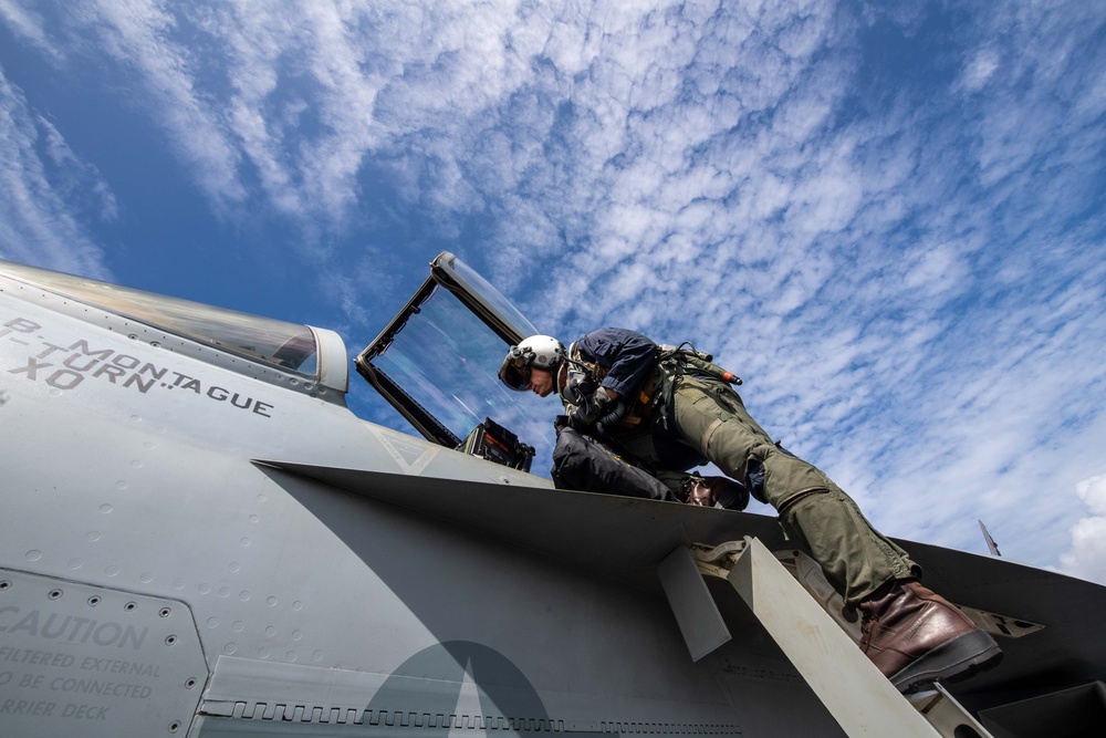 Rear Adm. Michael Wosje, commander of Carrier Strike Group ONE, completes his 1,000th trap flight aboard Nimitz-class aircraft carrier USS Carl Vinson (CVN 70)