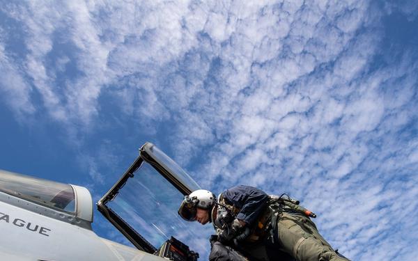 Rear Adm. Michael Wosje, commander of Carrier Strike Group ONE, completes his 1,000th trap flight aboard Nimitz-class aircraft carrier USS Carl Vinson (CVN 70)
