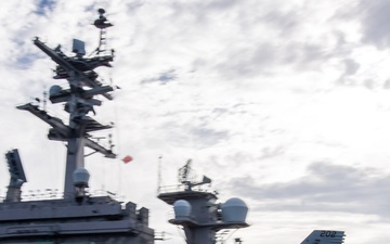 Rear Adm. Michael Wosje, commander of Carrier Strike Group ONE, completes his 1,000th trap flight aboard Nimitz-class aircraft carrier USS Carl Vinson (CVN 70)