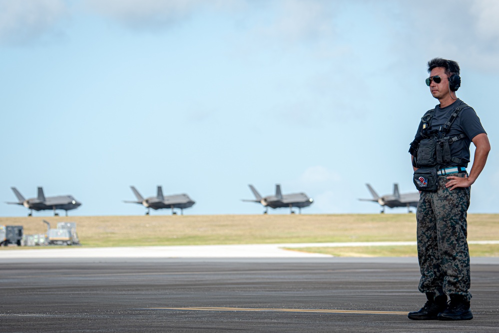 JASDF personnel, leadership come together to watch take-offs at Andersen AFB for CN25