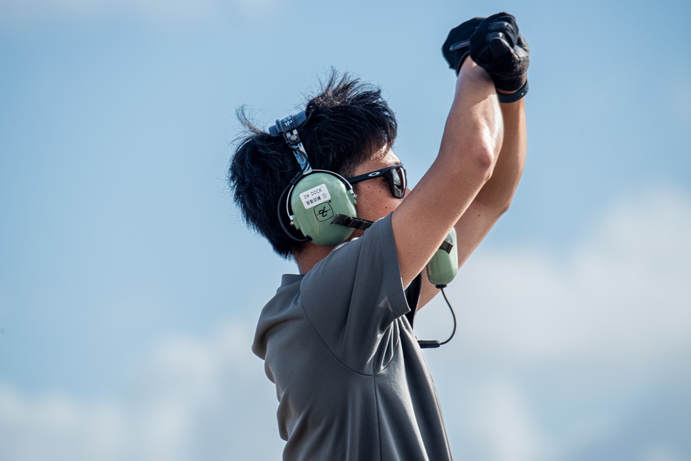 JASDF personnel, leadership come together to watch take-offs at Andersen AFB for CN25