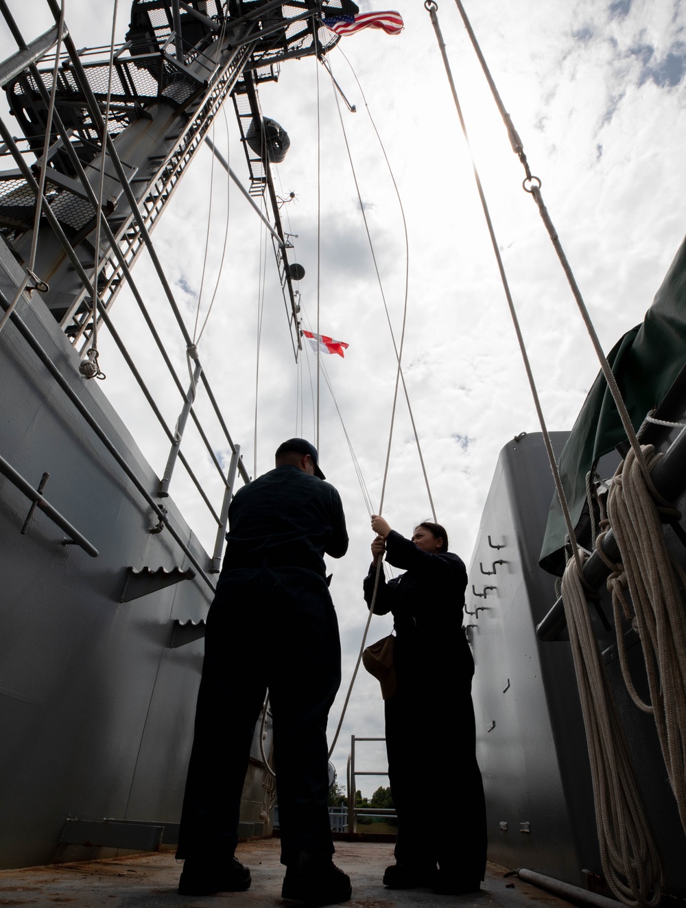 USS Emory S. Land (AS 39) departs Singapore