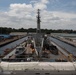 USS Emory S. Land (AS 39) departs Singapore