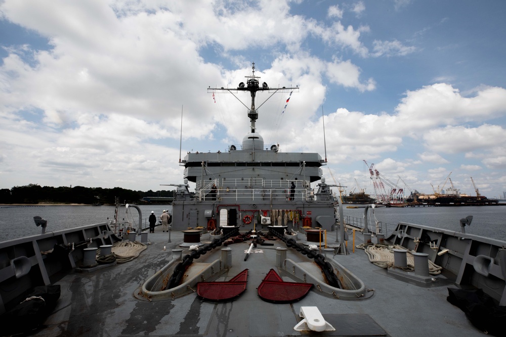 USS Emory S. Land (AS 39) departs Singapore