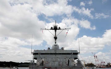 USS Emory S. Land (AS 39) departs Singapore