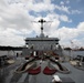 USS Emory S. Land (AS 39) departs Singapore