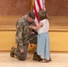 Two Soldiers are promoted during a ceremony at WRAIR