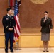 Two Soldiers are promoted during a ceremony at WRAIR