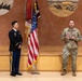 Two Soldiers are promoted during a ceremony at WRAIR