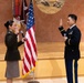 Two Soldiers are promoted during a ceremony at WRAIR