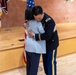 Two Soldiers are promoted during a ceremony at WRAIR