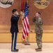 Two Soldiers are promoted during a ceremony at WRAIR