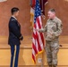 Two Soldiers are promoted during a ceremony at WRAIR