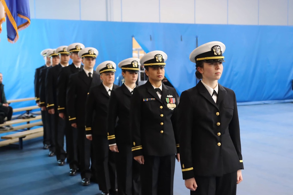 Officer candidates line up before marching to their seats