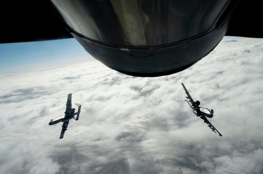 Fighters refueled over the clouds