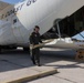 U.S. Service Members unload supplies in support of Joint Operation Southern Guard