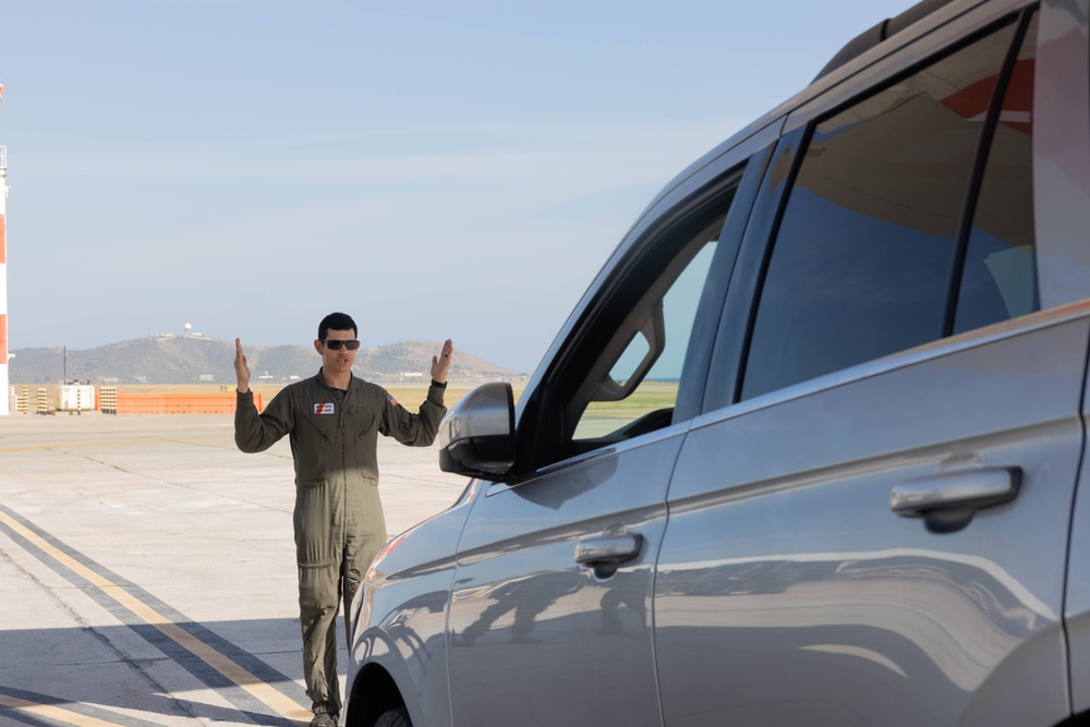 U.S. Service Members unload supplies in support of Joint Operation Southern Guard