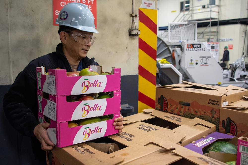 USS Ronald Reagan (CVN 76) Sailors receive fresh produce