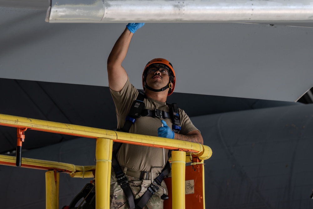 15th Maintenance Squadron performs routine maintenance on a C-17 Globemaster III