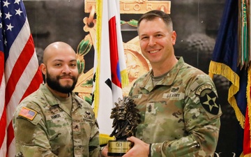 U.S. Army soldiers receive Career Counselor of the Year Awards.