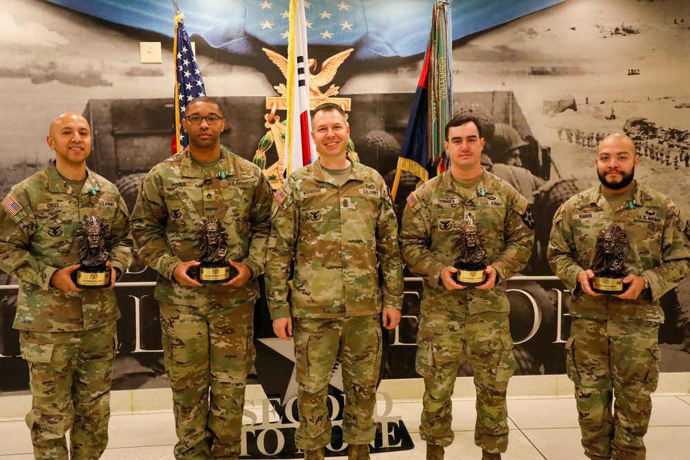 U.S. Army soldiers receive Career Counselor of the Year Awards.