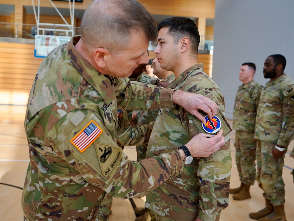 U.S. Army Garrison Wiesbaden Soldiers adopt new patch in ceremony