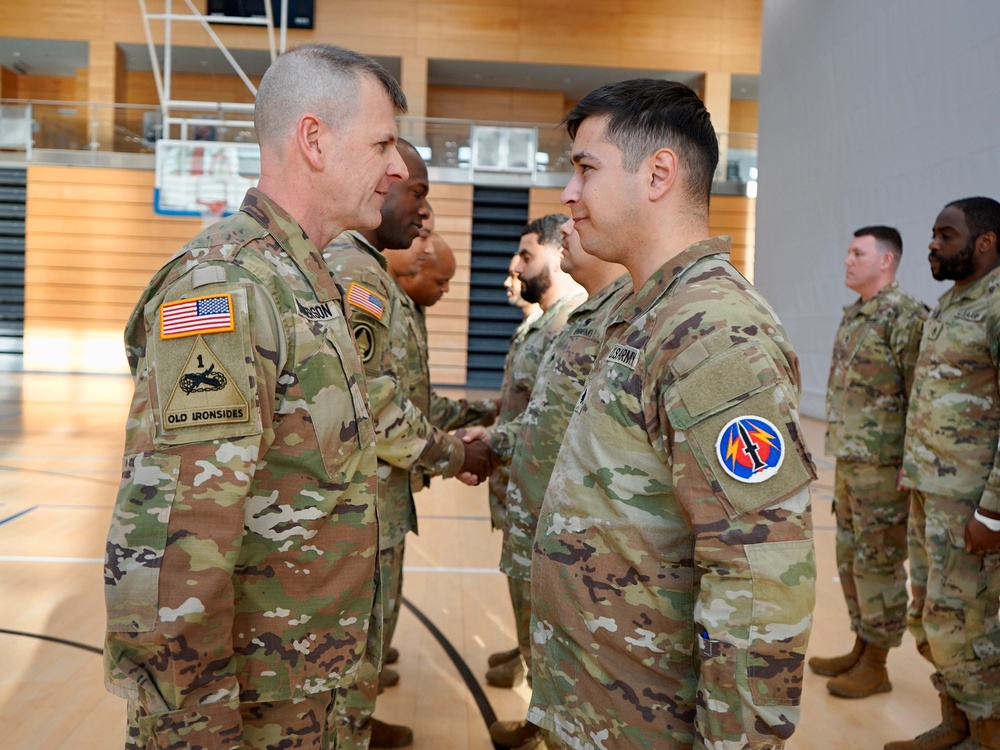 U.S. Army Garrison Wiesbaden Soldiers adopt new patch in ceremony