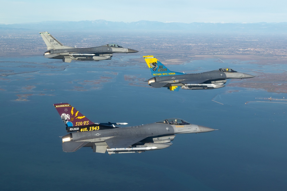 F-16s soar through the sky