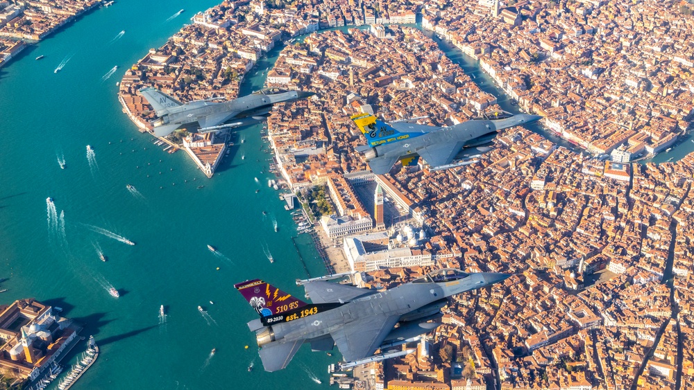 F-16s soar through the sky